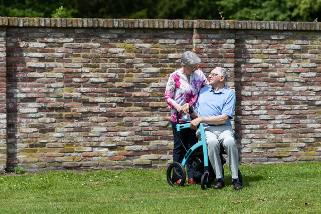 An older couple spending time together outdoors.